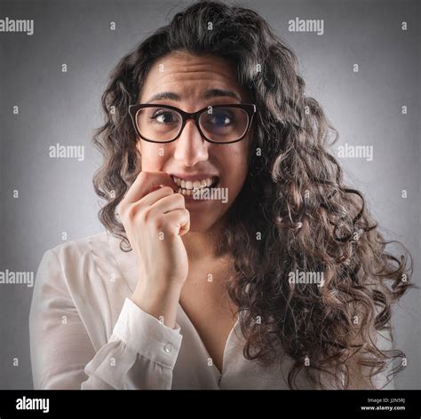 Nervous Woman In Glasses Stock Photo Alamy