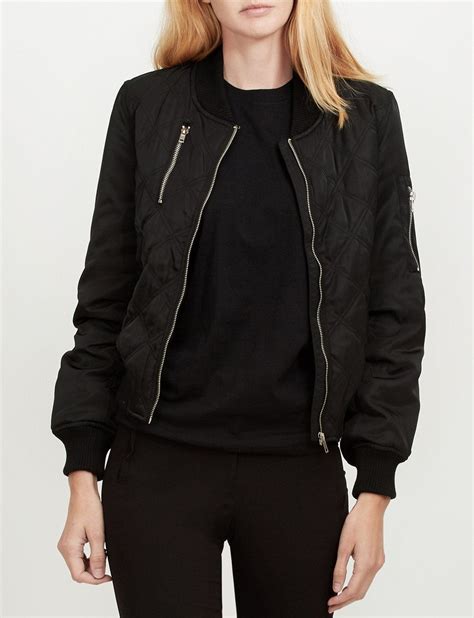 This Classic Zip Up Quilted Bomber Jacket With Pockets Offers Comfort And Style Snug Ribbed