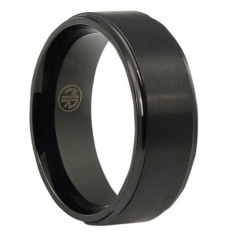 We believe in forging new traditions with i purchased the hockey puck wedding ring for my husband from titanium buzz. Mens Black Titanium Ring