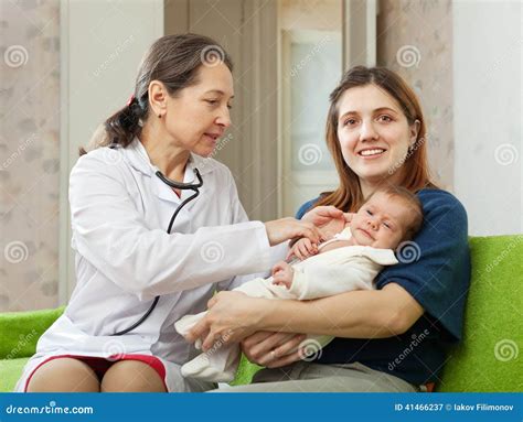 Doctor Examining Newborn Baby Stock Image Image Of Healthy Mature
