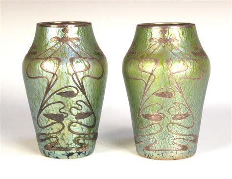 A Pair Of Art Nouveau Silver Mounted Iridescent Glass Vases Probably Loetz Circa 1900 Each Green