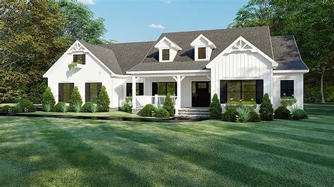 4 Bedroom Farmhouse Plan With Covered Porches And Open Layout