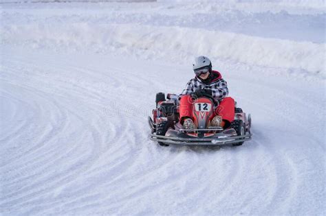 Go Karting On Icy Track In Winter Adult Kartng Driver In Action On