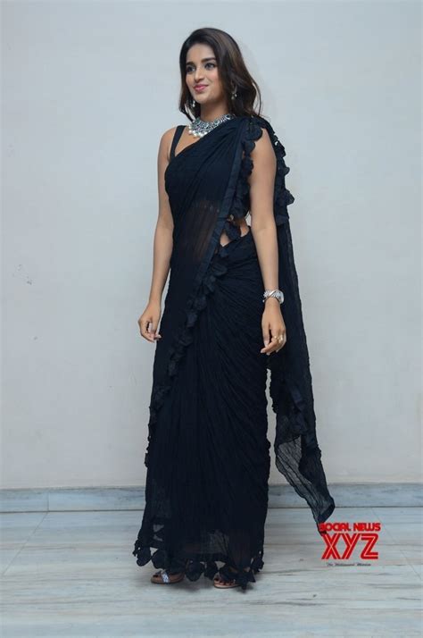 actress nidhhi agerwal stills from ismart shankar movie pre release press meet social news xyz