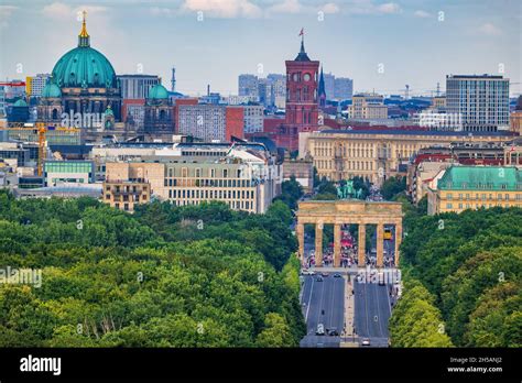 Berlin City Skyline In Germany With View Over Tiergarten Park To
