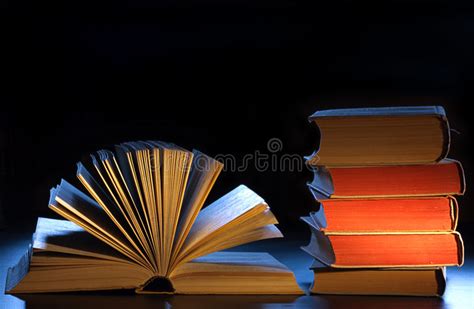 Stack Books Open Book And Copyspace Stock Image Image Of Floodlit