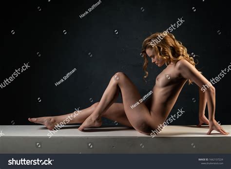Beautiful Tall Blonde Woman Lying Nude Stock Photo