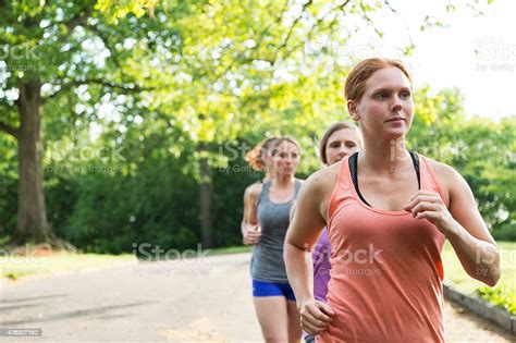 Group Of Female Athletes Jogging Stock Photo Download Image Now 20