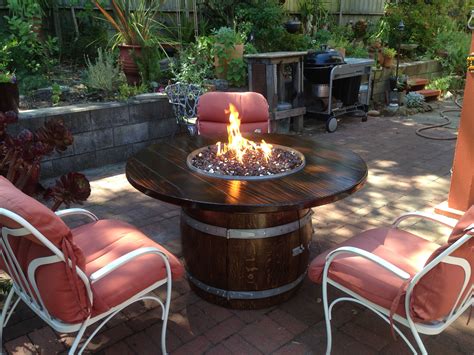 Pin By Pat Moran On Wine Barrel Fire Table Outdoor Fire Table Fire Glass Fire Pit