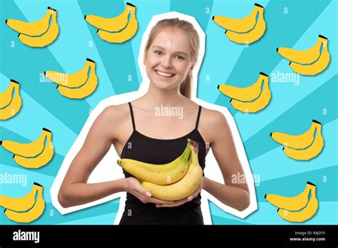 Pretty European Blonde Woman Holding Several Bananas In Her Hands And