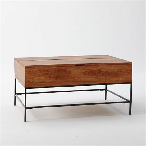 The same good looks as the industrial storage console we have come to enjoy for years plus storage compartment in a coffee table? Industrial Storage Coffee Table | west elm