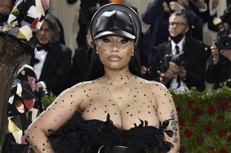Nicki Minaj Makes Met Gala 2022 Arrival In Barely There Boots Feathers And So Much Tulle