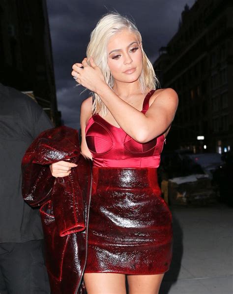 Get Kylie Jenners Daring Red Outfit As She Debuts Striking New Look In