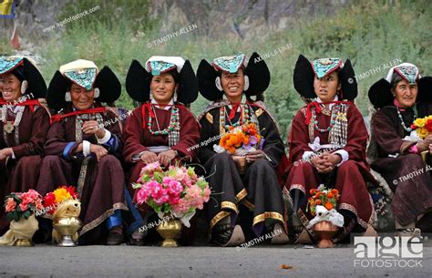 Buddhist Ladakhi Women Wearing Traditional Dress And Hats With Long