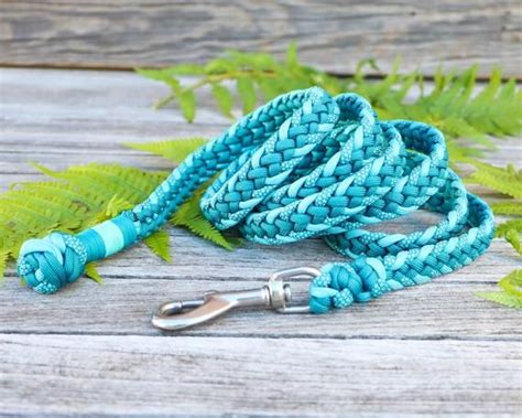 Braided paracord split reins plus leather popper made to etsy. Custom paracord dog leash * braided * turquoise * with name tag * various length | Paracord ...