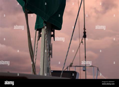 Sailboat Mast Boom And Rigging With View Of Pastel Sky Stock Photo Alamy