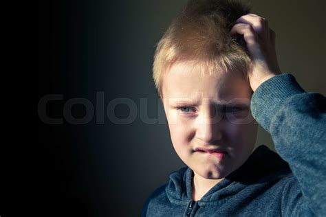 Boy Scratching Head Confused Stock Image Colourbox