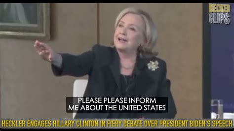 Heckler Engages Hillary Clinton In Fiery Debate Over President Bidens