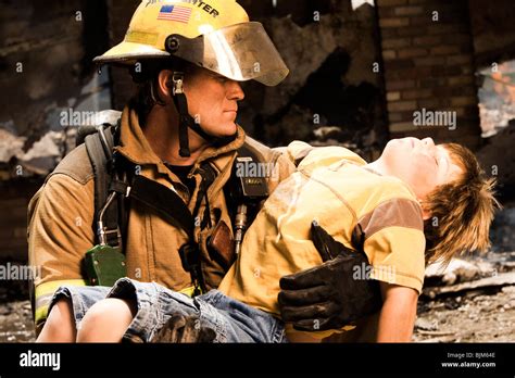 Fire Fighter Rescuing Child Stock Photo Royalty Free Image 28718046