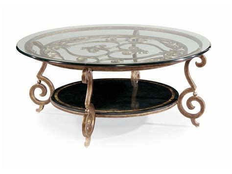 What reminds you of the base of this glass rectangular bronze coffee table top? The Best Bronze Coffee Table Glass Top