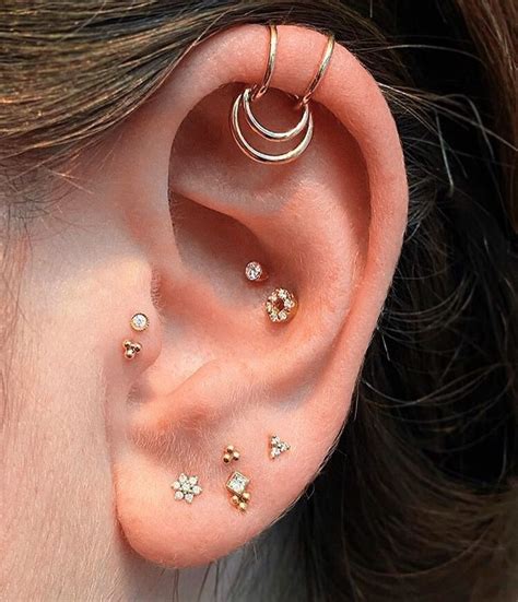 Ear Curation On Instagram “double Upper Helix Double Conch Double Tragus And Four Lobe
