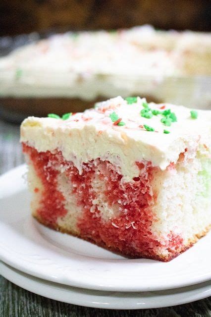 Cake with jello drizzles poked throughout, and topped with a smooth layer of whipped cream! Christmas Poke Cake~ Festive and delicious Christmas Poke Cake. Delight your friends and family ...