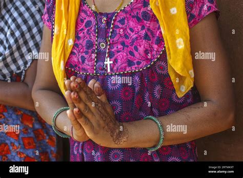 Christian Adivasi Woman Joining Hands In A Village In Narmada District