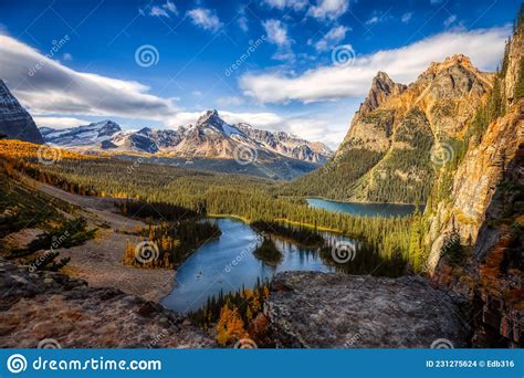 Scenic View Of Glacier Lake With Canadian Rocky Mountains Stock Photo