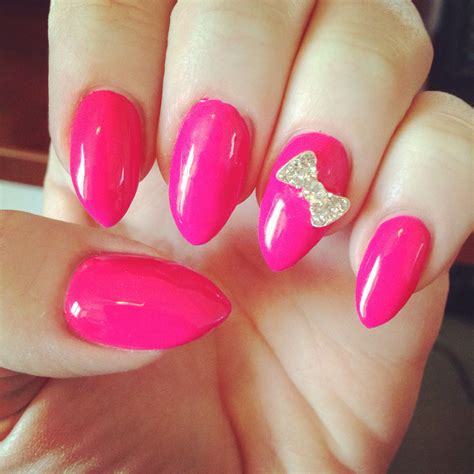 Hot Pink Gel Nails With A Rhinestone Bow Gel Nail Colors Gel Nail Art