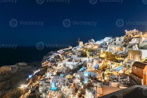 Classic Oia Santorini Skyline At Night With Buildings In Greece