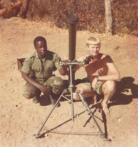 Members Of A Rhodesian Mortar Crew Pose For The Camera During The Bush
