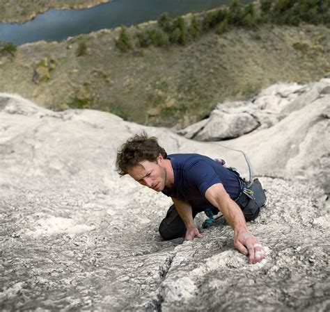 Rod Mclean Photography Close Up Picture Of Man Climbing Mountain