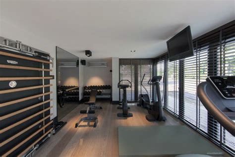 Office / gym decor style. 40 Personal Home Gym Design Ideas For Men - Workout Rooms