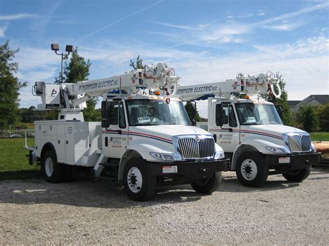 Full Fleet Of Service Vehicles At Thompson Electric Inc