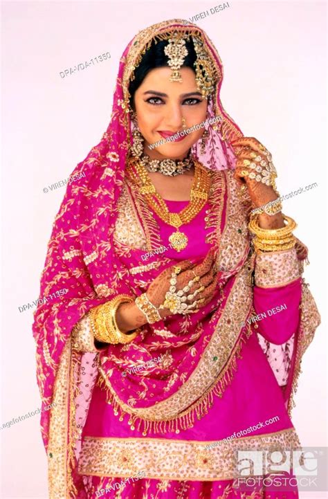 Indian Muslim Bride Wearing Traditional Wedding Dress Gold Jewellery