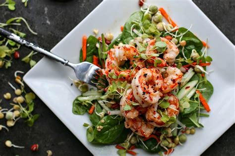 You may find the name of this to be similar to tom yum goong soup which is hot and sour shrimp soup. Toasted Sesame Salad With Spicy Shrimp | Killing Thyme