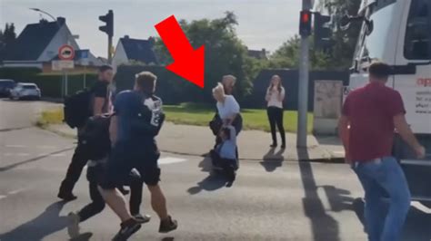 Woman Drags Climate Activist By The Hair To Stop Her From Blocking Traffic 1 Minute Video