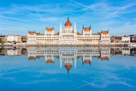 Hungarian Parliament Building Reflected In Danube River Budapest