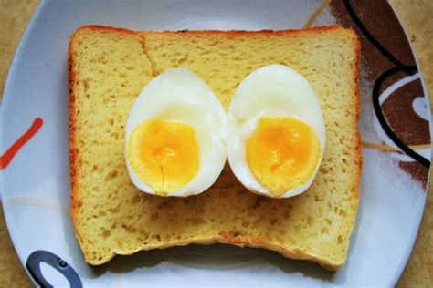 Remove the eggs and bring the water to a boil over high heat and immediately add meanwhile, spread still warm toast with butter to melt. Boiled Egg On Bread Free Stock Photo - Public Domain Pictures