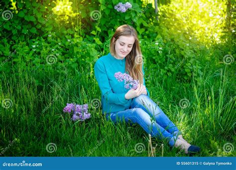 Beautiful Girl Sitting On The Grass In The Park Stock Image Image Of