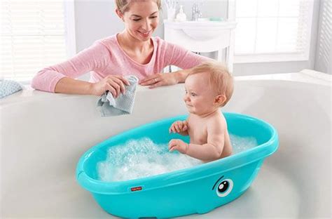 This adorable shape helps make bathing infants easier. 10. Fisher-Price Whale of an Infant Tub Bathtub | Baby tub ...