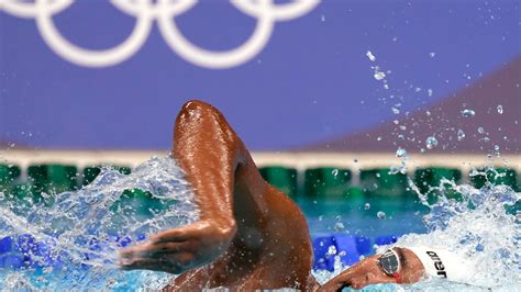 tunisian teen wins surprise olympic swimming gold