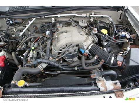 The restyling includes a raised hood to provide room for the. 2003 Nissan Frontier XE V6 Crew Cab 4x4 3.3 Liter SOHC 12 ...