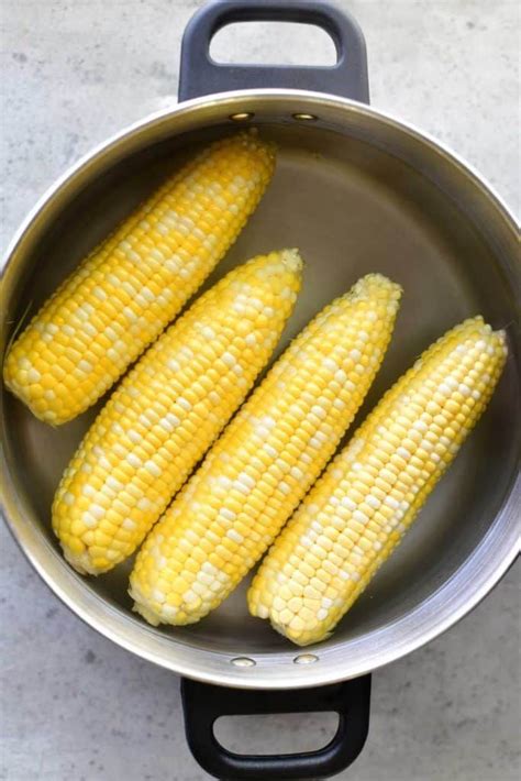 They are ready when you can pierce the bottom without resistance. how long to boil corn on the cob in 2020 | Boiled corn ...