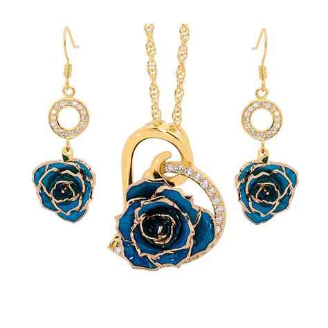 The sparkling 40 natural diamonds are set in a prong. Gold Dipped Rose & Blue Matched Jewelry Set in Heart Theme