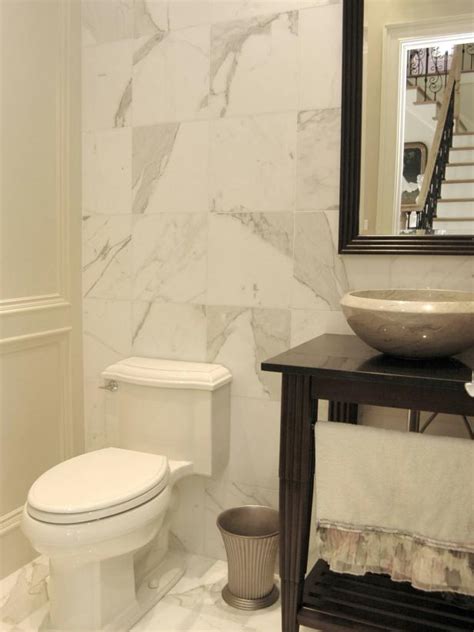 Contemporary White Powder Room With Elegant Marble Walls And Flooring