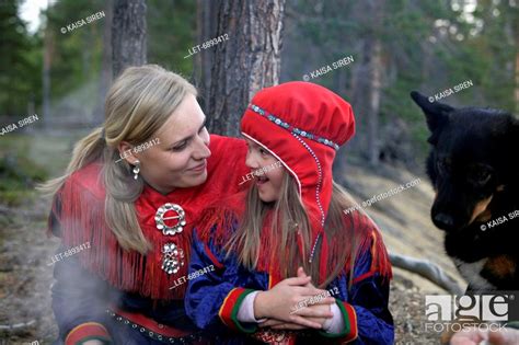 A Sami Mother And A Daughter Dressed In The Traditional Lapp Dress And
