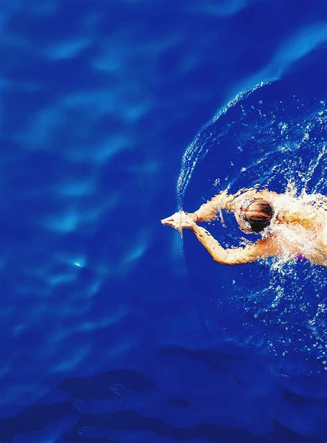 Hd Wallpaper Close Up Photography Of Woman Swimming On Calm Water