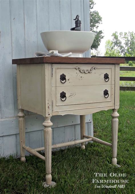 Old pieces of furniture are just items waiting to be repurposed. The Olde Farmhouse on Windmill Hill: Powder Room Vanity {Repurposed Sewing Cabinet}