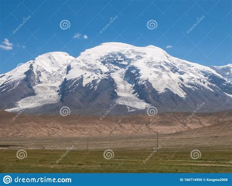 Great Snow Capped Mountain Peak Of Mount Muztag Ata On The Pamirs